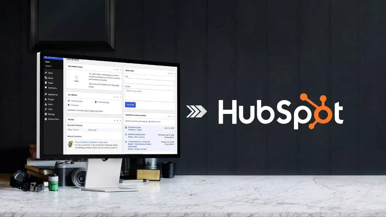 A screen on a standalone CMS guides the migration to HubSpot