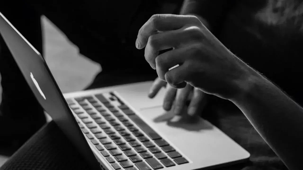 Working on computer with Marketing Automation