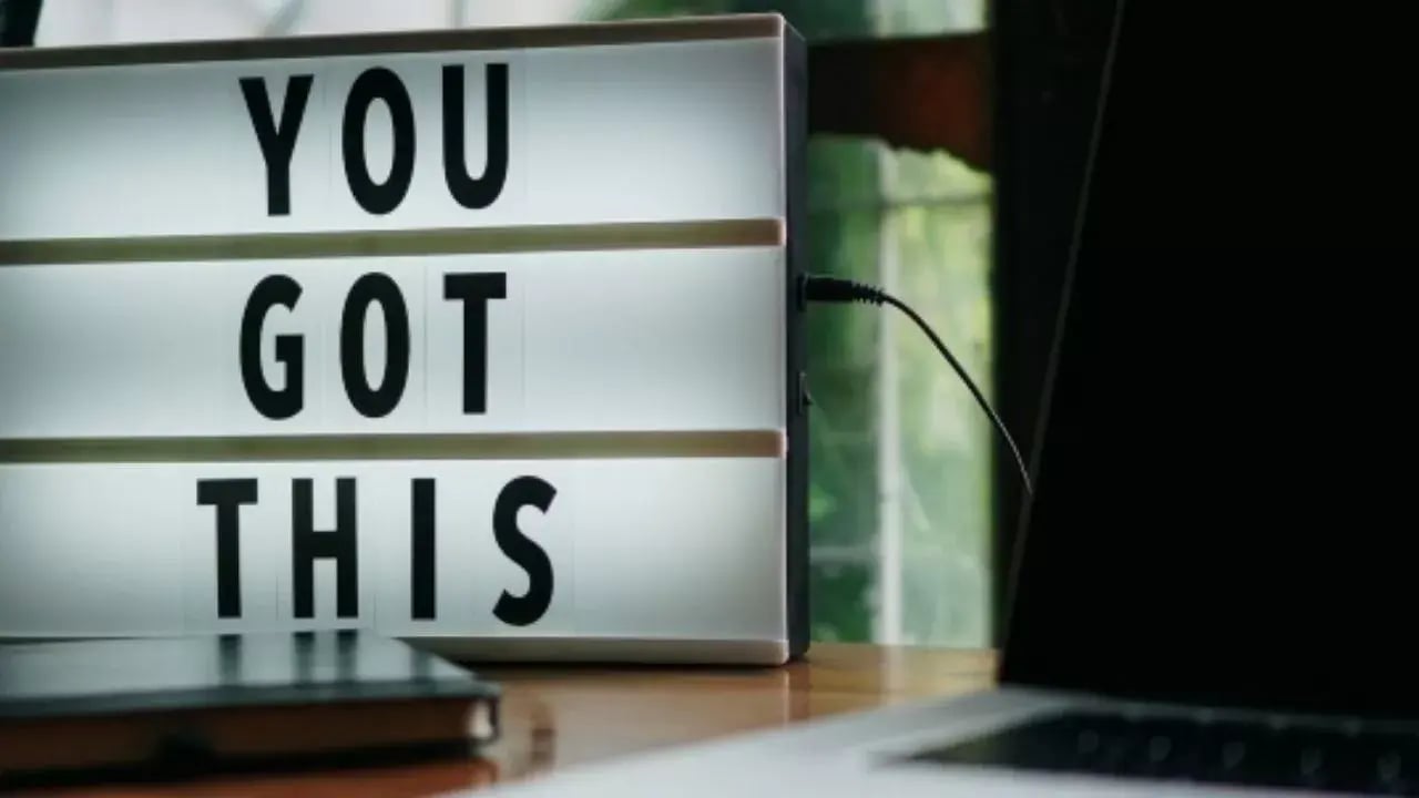 A sign on the table that says you got this